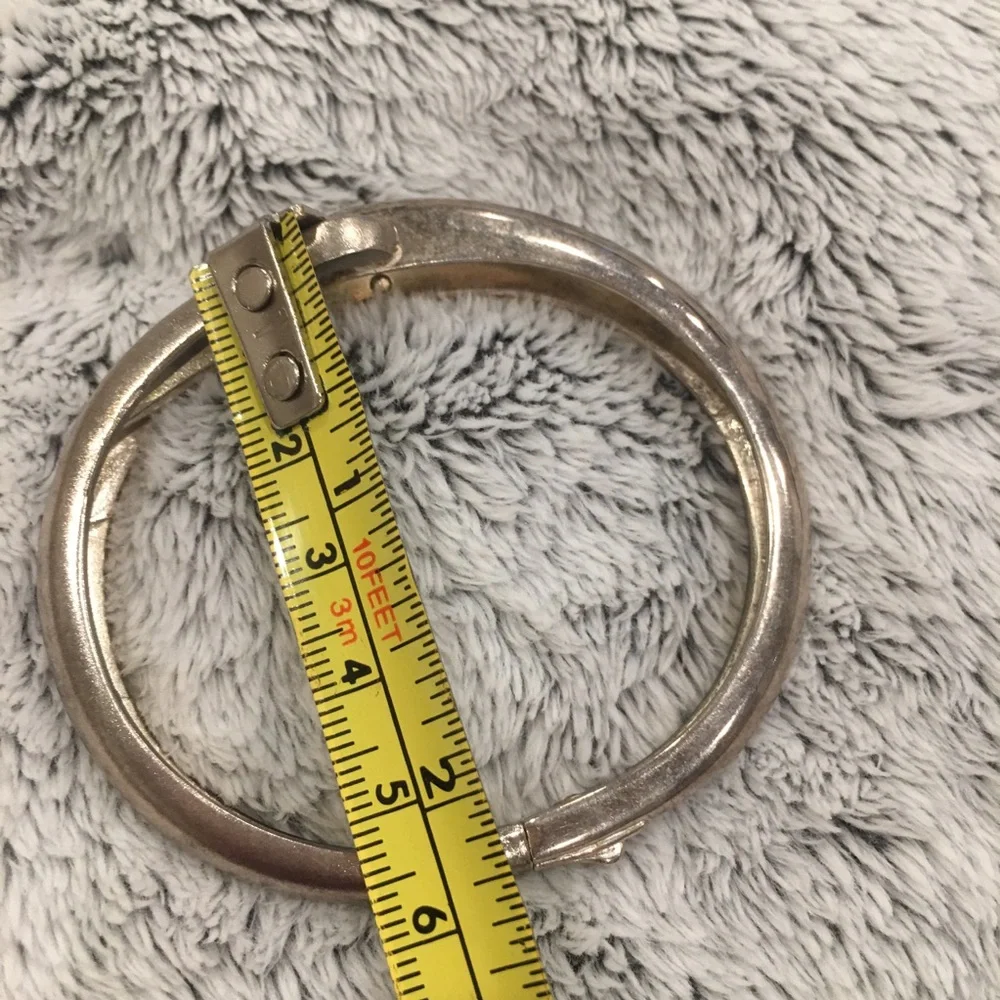 Silver tone bangle